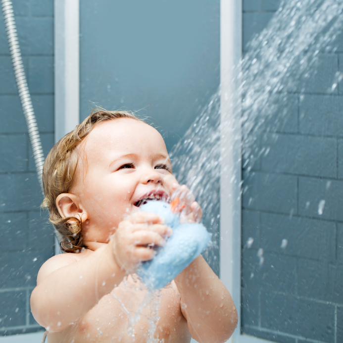 baby playing in water